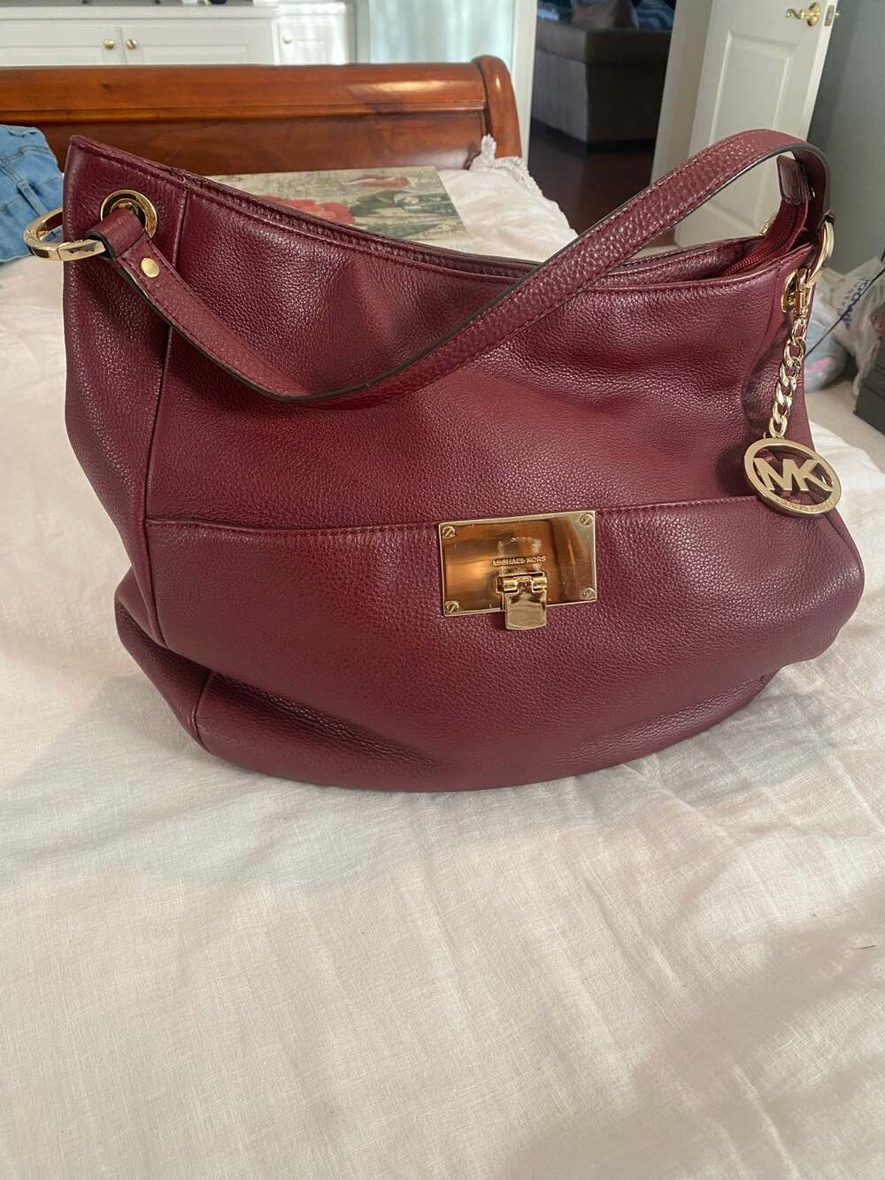 Michael Kors Pebbled Leather Hobo Shoulder Bag in a rich burgundy/wine shade